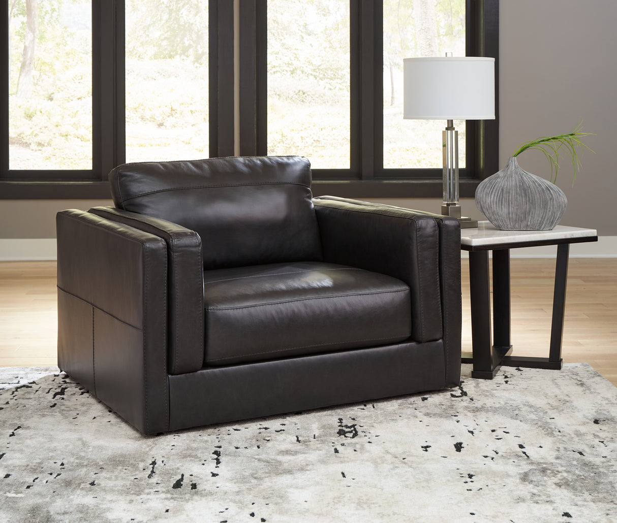 Furniture City Slidell - Ashley Furniture - Amiata Living Room - Chair and a Half / Onyx - 5740523