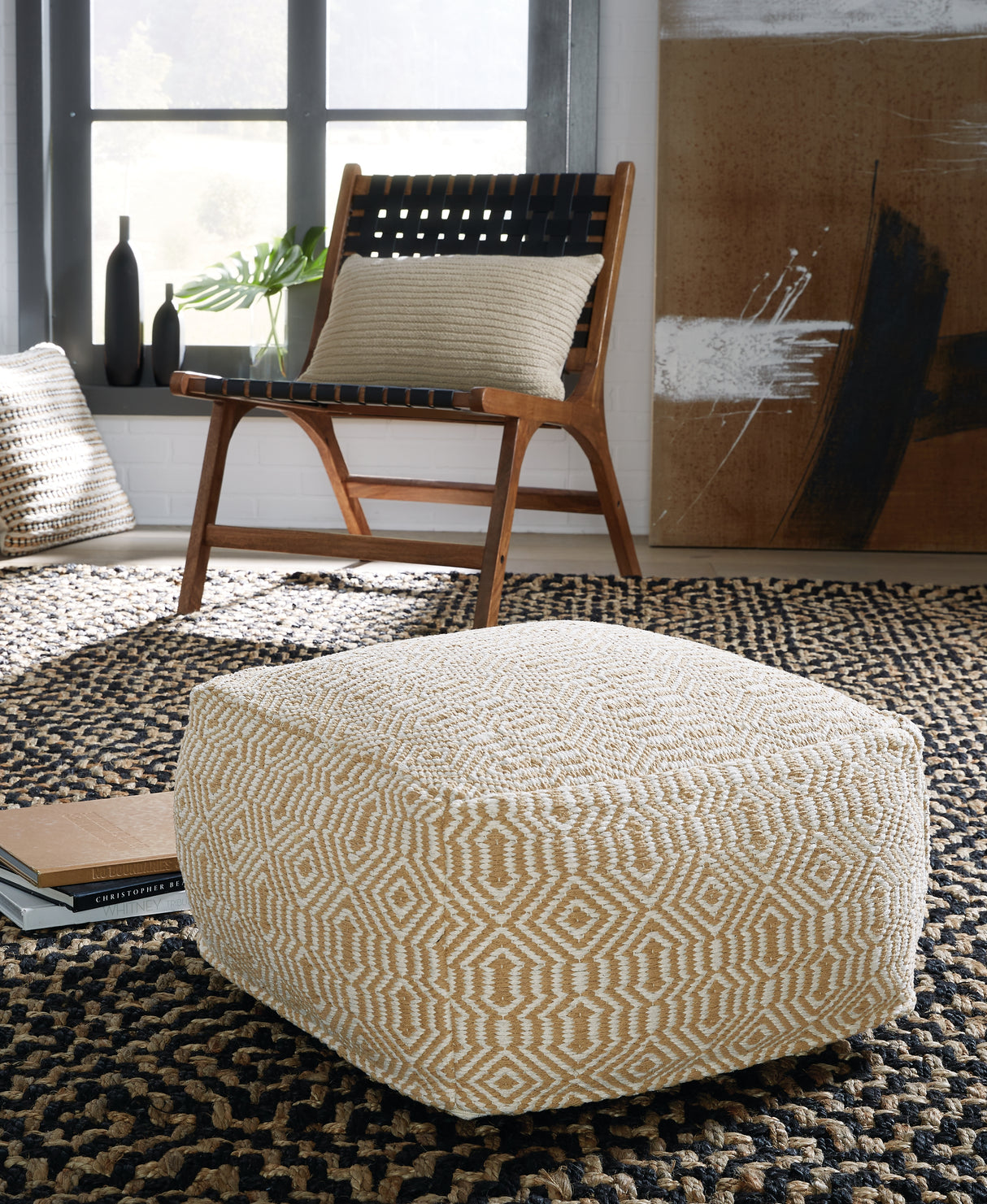 Furniture City Slidell - Ashley Furniture - Adamont Pouf - Pouf / Tan/Ivory - A1001059