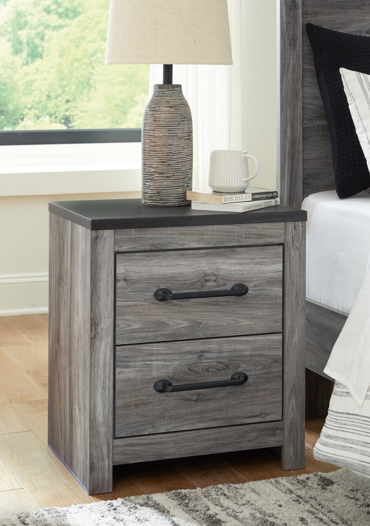 Furniture City Slidell - Ashley Furniture - Bronyan Bedroom - Two Drawer Night Stand / Dark Gray - B1290-92