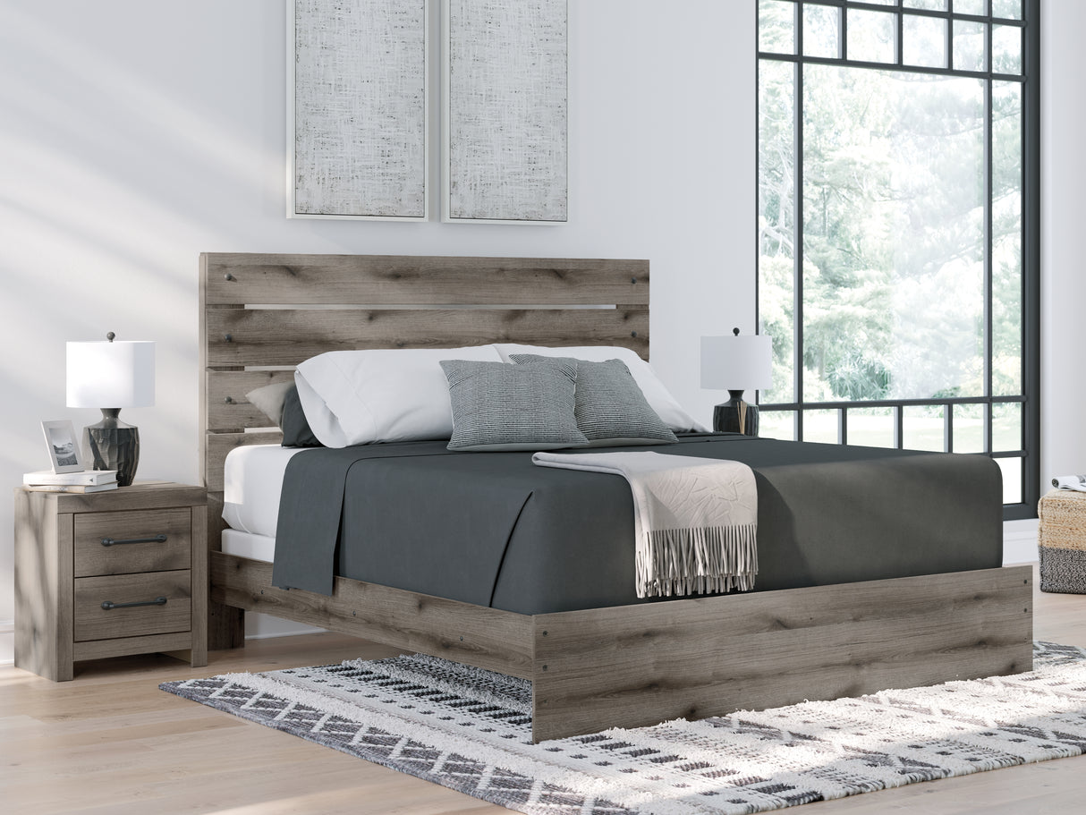 Furniture City Slidell - Ashley Furniture - Graystorm Bedroom - King Panel Bed / Brown Gray - PCB2405B8