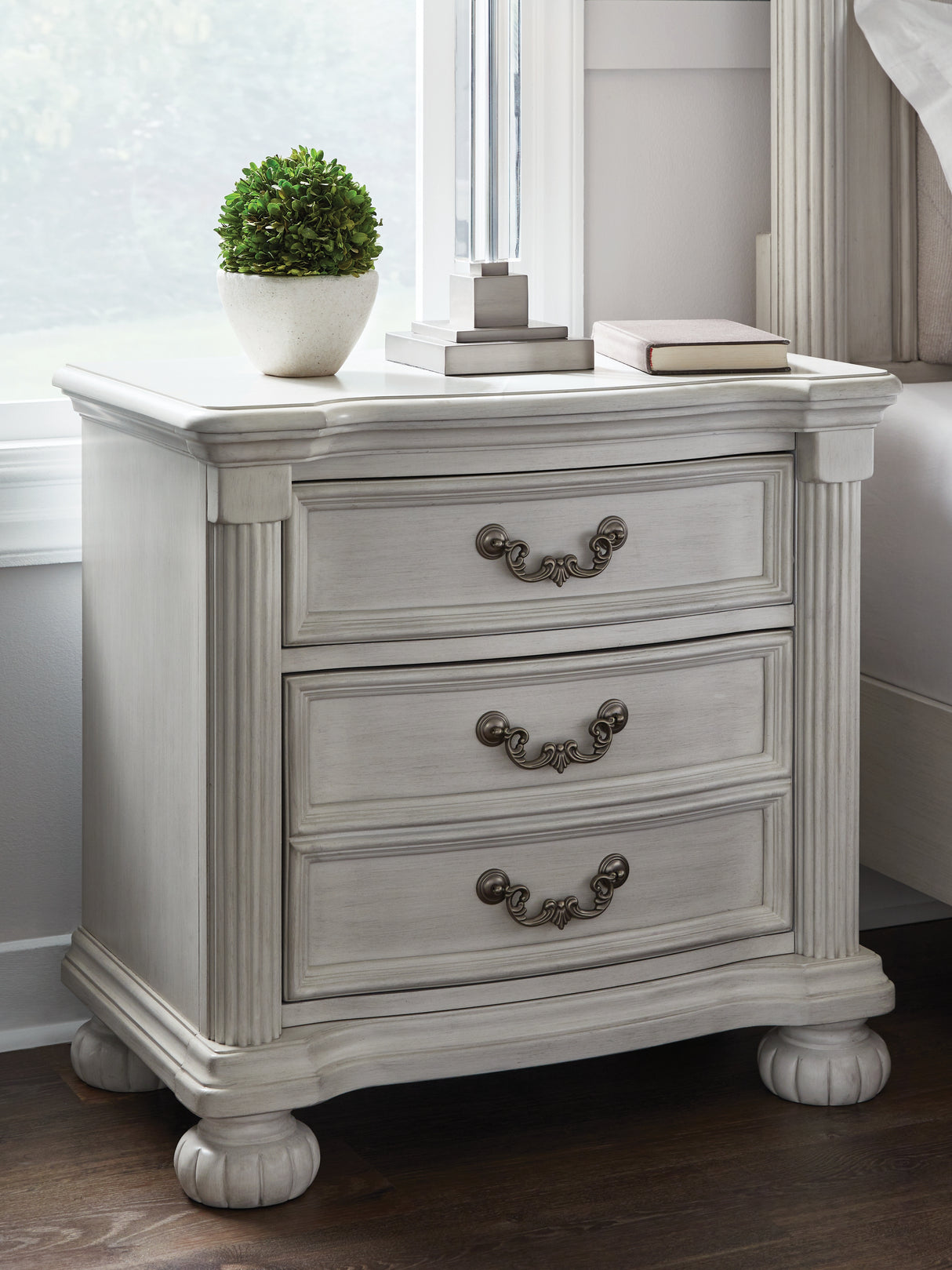 Furniture City Slidell - Ashley Furniture - Montelaine Bedroom - Three Drawer Night Stand / Antique White - B795-93
