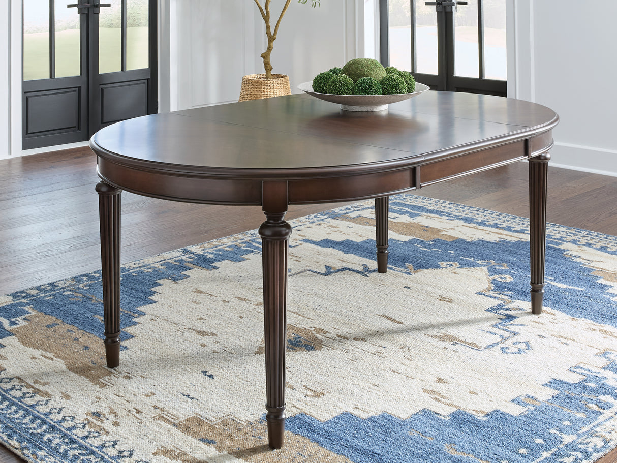 Furniture City Slidell - Ashley Furniture - Lavinton Dining Room - Oval Dining Room EXT Table / Brown - D764-35
