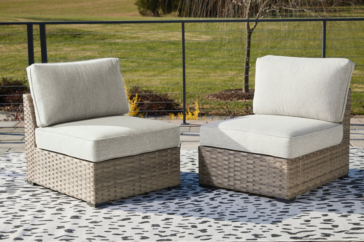 Furniture City Slidell - Ashley Furniture - Calworth Outdoor - Armless Chair w/Cushion (Set of 2) / Beige - P458-846