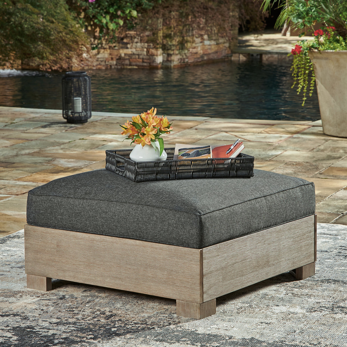 Furniture City Slidell - Ashley Furniture - Citrine Park Outdoor - Ottoman with Cushion / Brown/Charcoal - P660-814