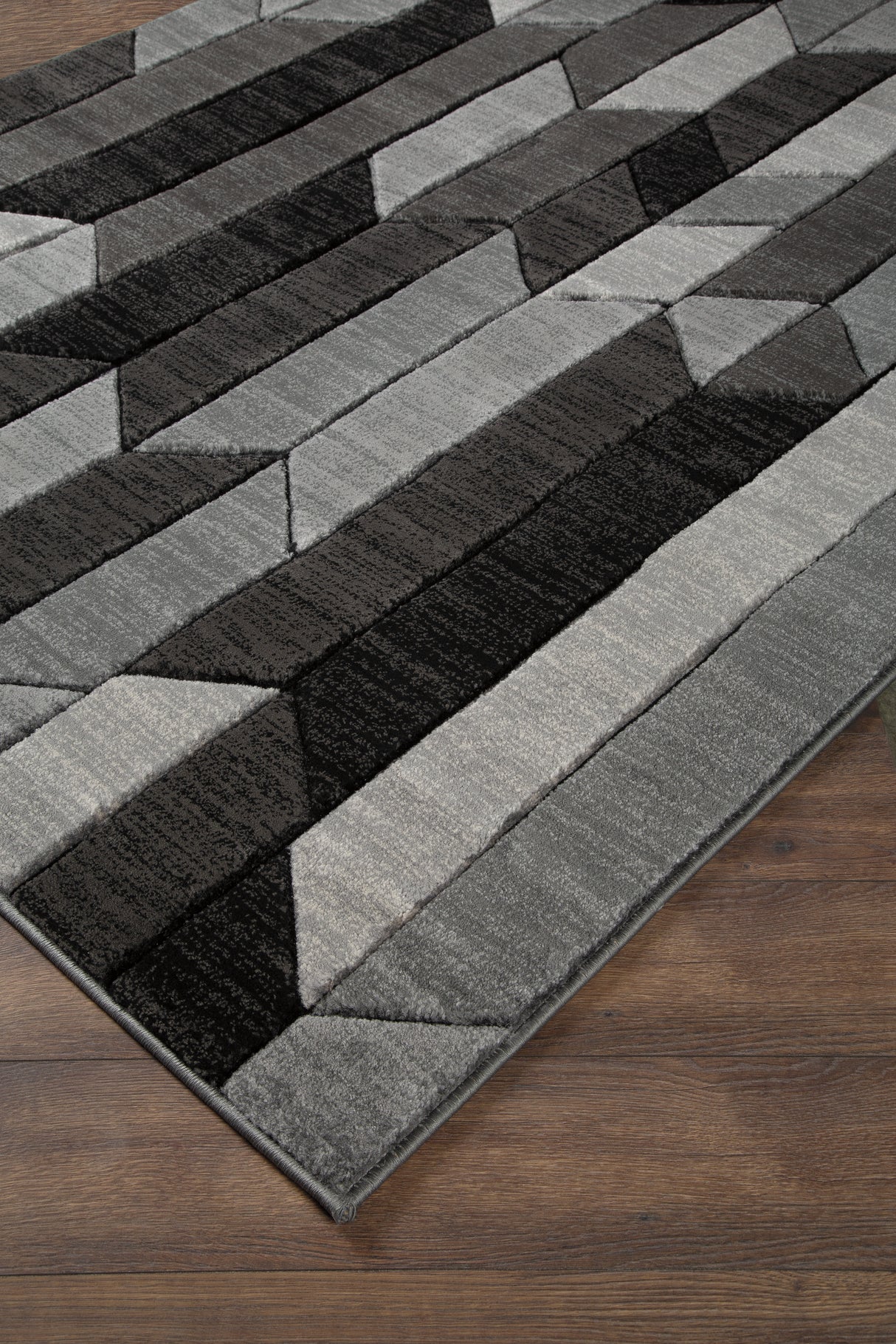 Furniture City Slidell - Ashley Furniture - Chayse Rug - 6'6" x 9'6" Rug / Black/Gray - R403461