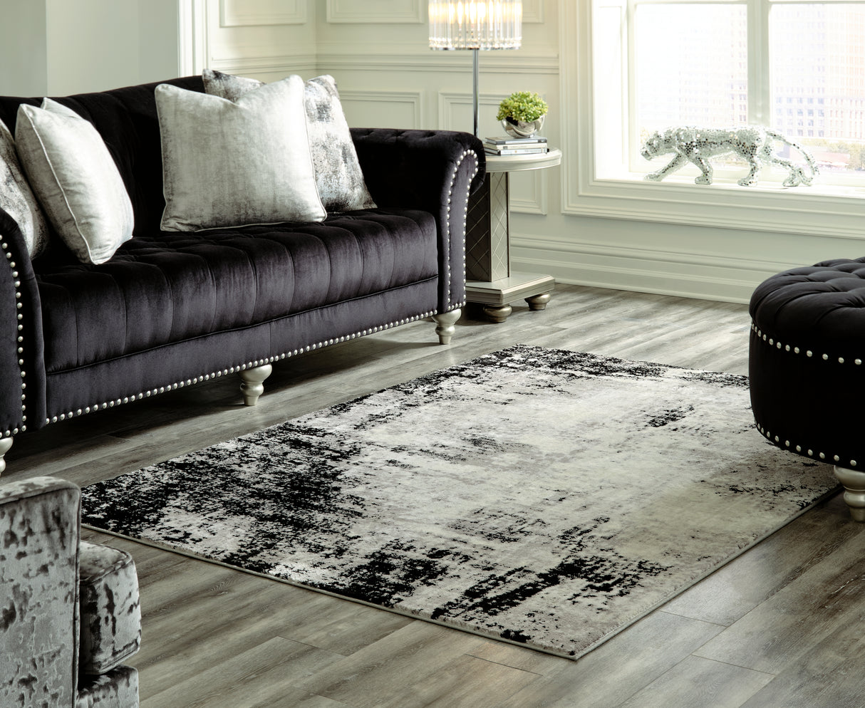 Furniture City Slidell - Ashley Furniture - Zekeman Rug - 7'10" x 10' Rug / Black/Cream/Gray - R404921