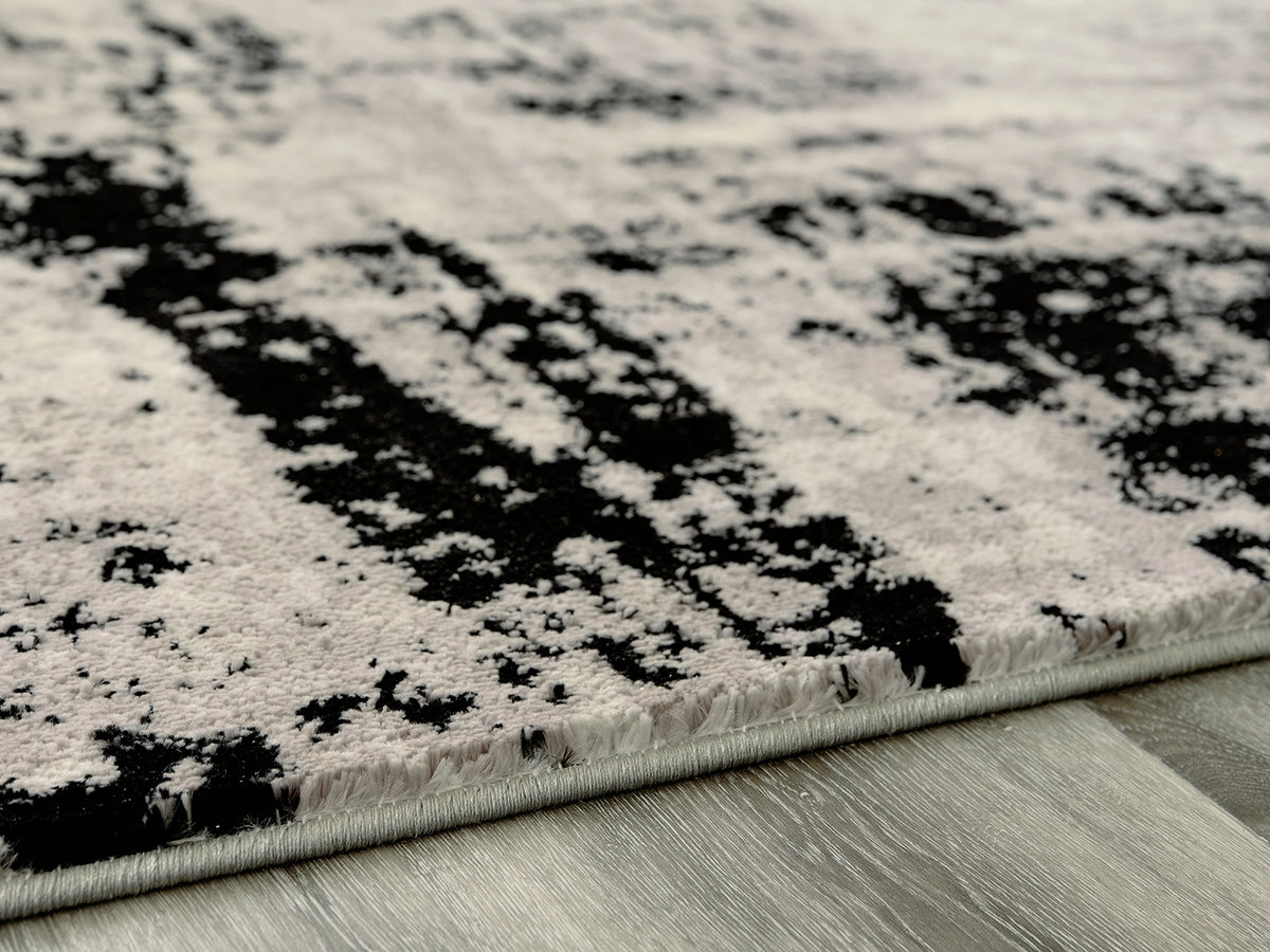 Furniture City Slidell - Ashley Furniture - Zekeman Rug - 5'3" x 7'7" Rug / Black/Cream/Gray - R404922
