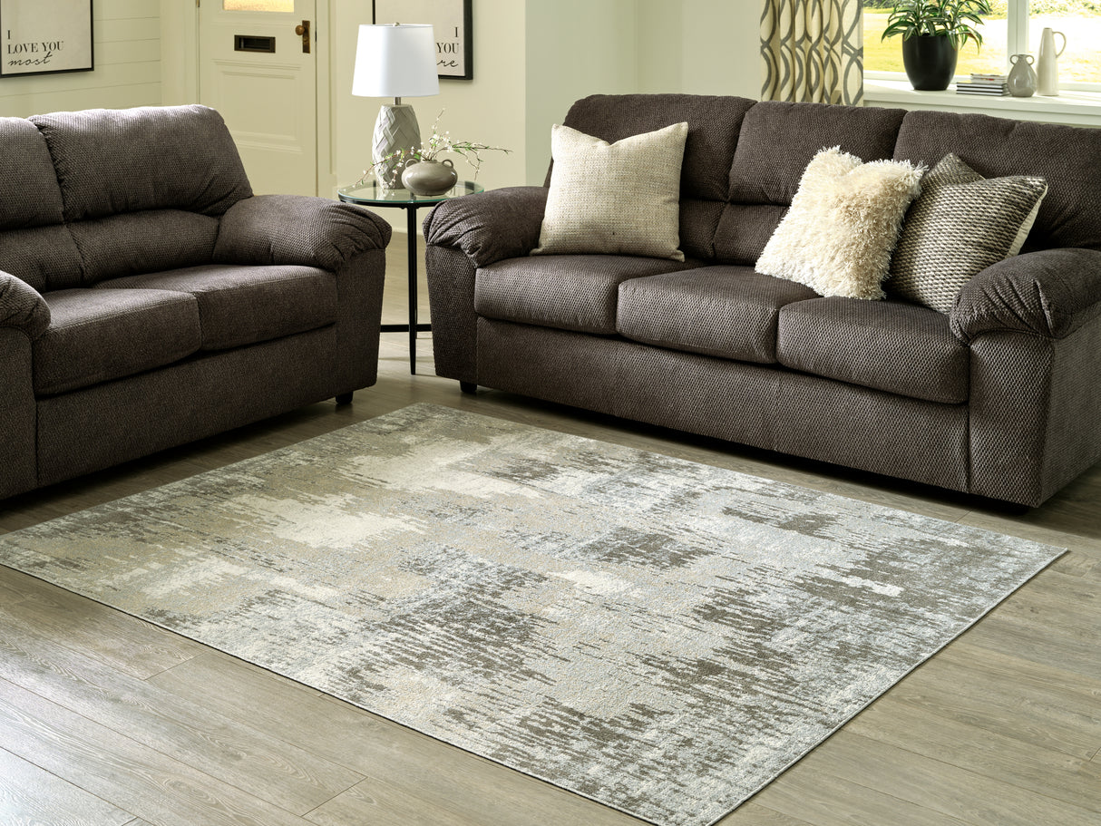 Furniture City Slidell - Ashley Furniture - Arriston Rug - 5'3" x 7' Washable Rug / Multi - R405562