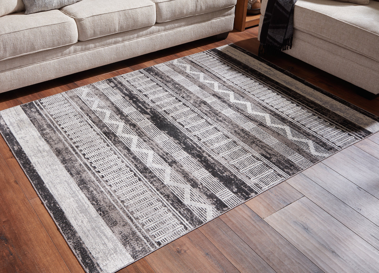 Furniture City Slidell - Ashley Furniture - Henchester Rug - 5' x 7' Washable Rug / Multi - R405992