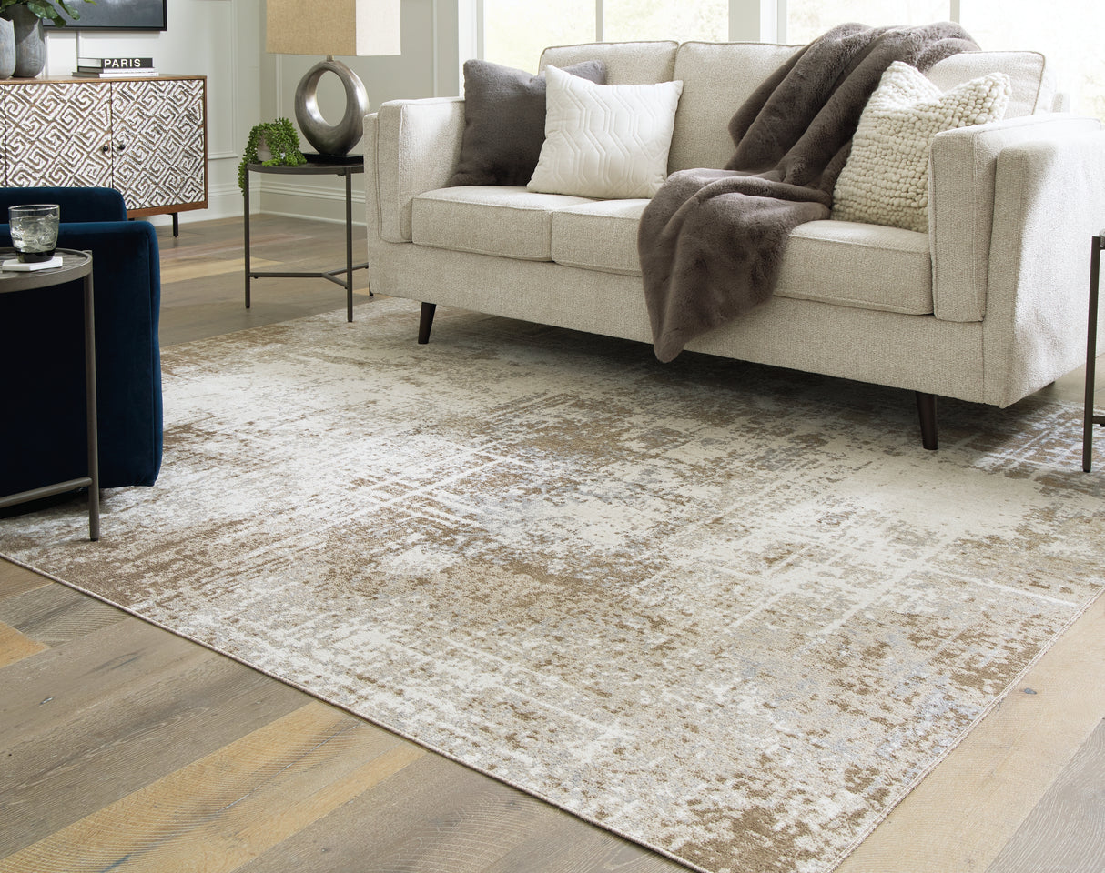 Furniture City Slidell - Ashley Furniture - Grifflain Rug - 7'10" x 10'3" Washable Rug / Tan/Brown/Gray - R406231
