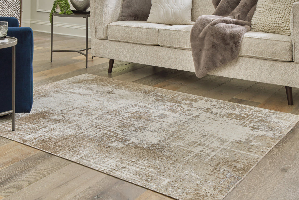 Furniture City Slidell - Ashley Furniture - Grifflain Rug - 5'1" x 7' Washable Rug / Tan/Brown/Gray - R406232