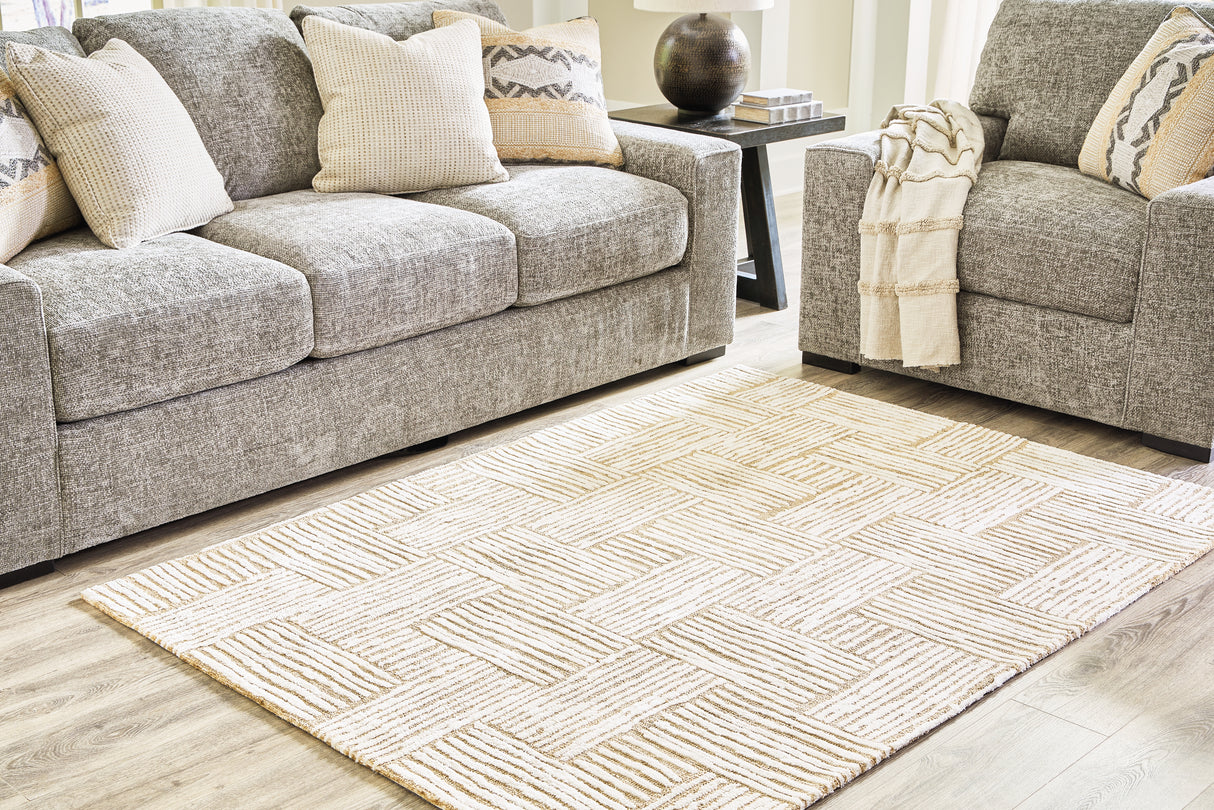 Furniture City Slidell - Ashley Furniture - Adanmund Rug - 5' x 7' Rug / Beige/Caramel - R406412