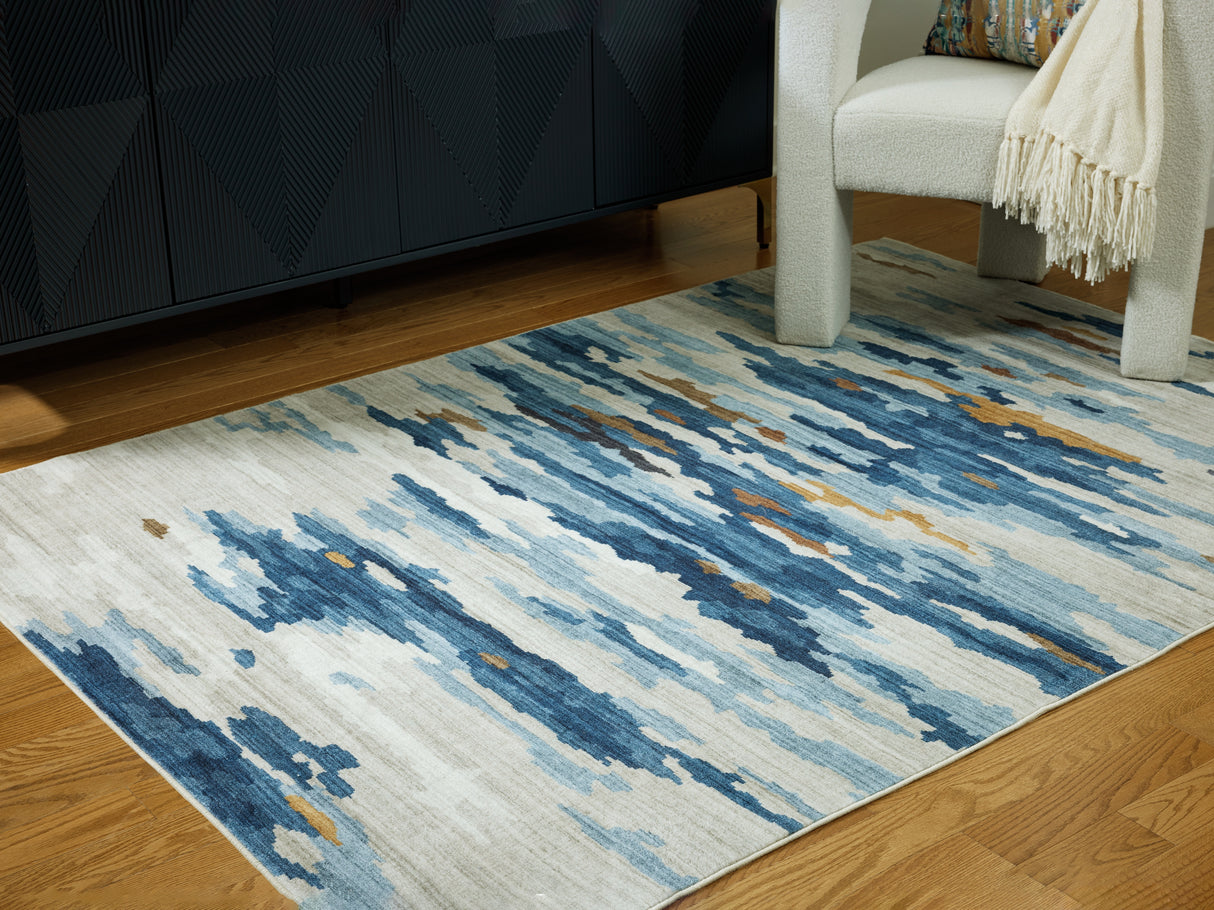 Furniture City Slidell - Ashley Furniture - Vinlett Rug - 5' x 7' Washable Rug / Cream/Blue/Brown - R407042