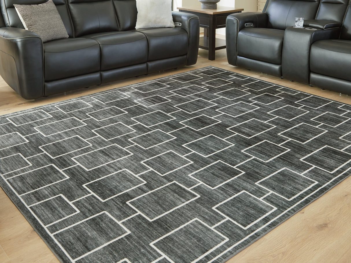 Furniture City Slidell - Ashley Furniture - Elderland Rug - Washable 7'6" x 9'6" Area Rug / Black/Gray - R407401