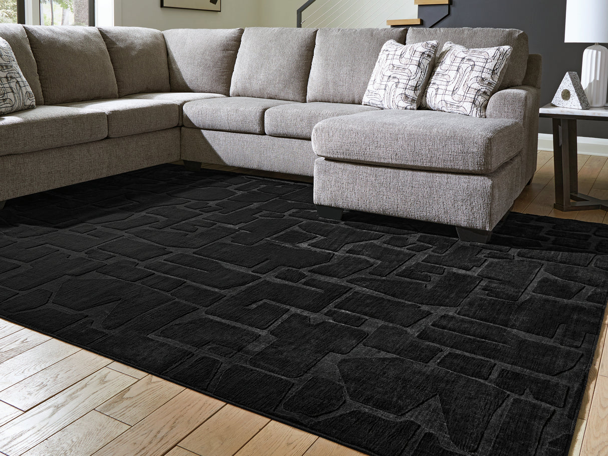 Furniture City Slidell - Ashley Furniture - Gibbswell Rug - Washable 8' x 10' Area Rug / Black - R407461