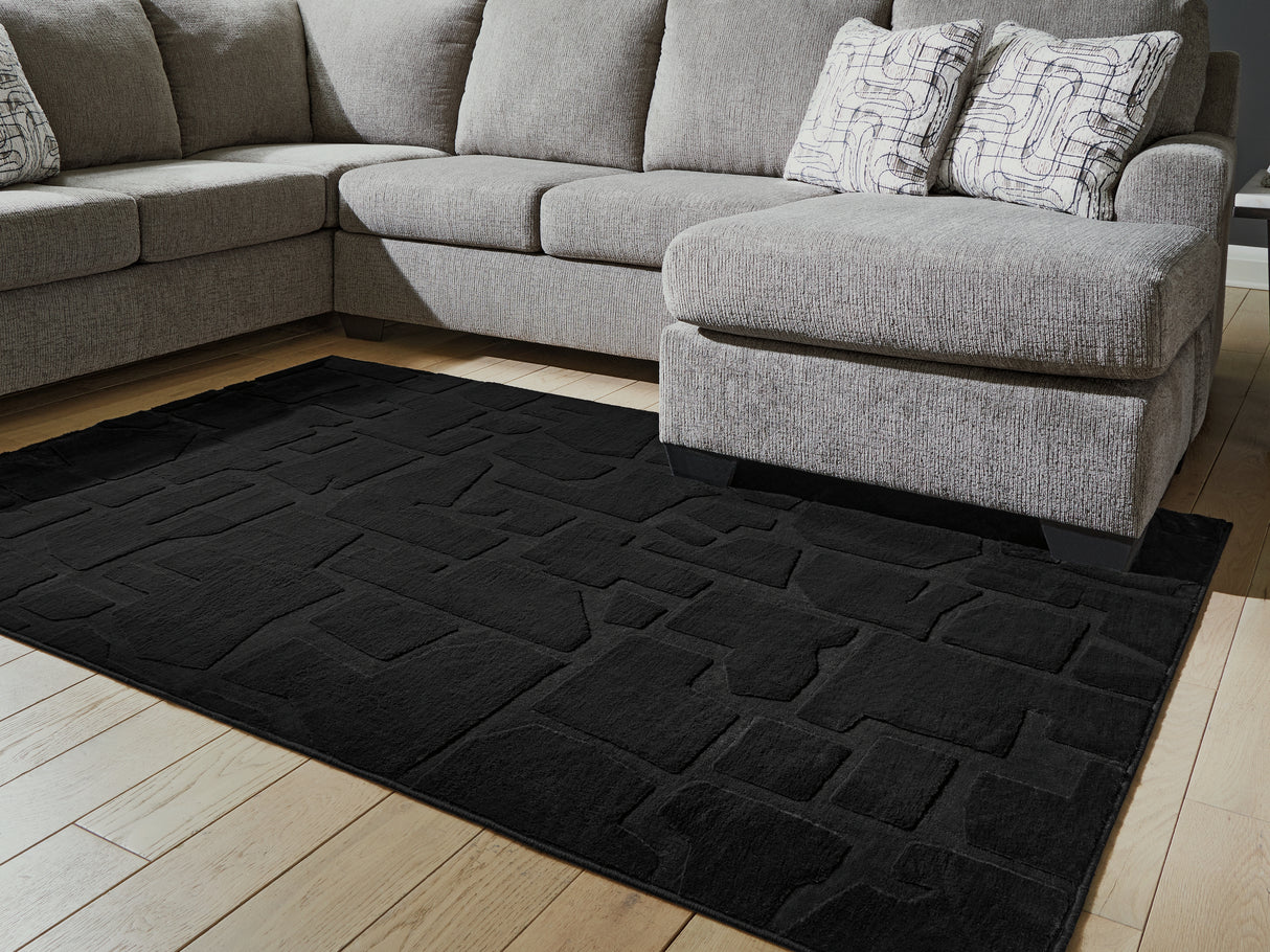 Furniture City Slidell - Ashley Furniture - Gibbswell Rug - Washable 8' x 10' Area Rug / Black - R407461
