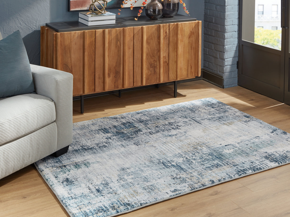 Furniture City Slidell - Ashley Furniture - Arlenmont Rug - 5' x 7' Area Rug / Blue/White/Brown - R407482