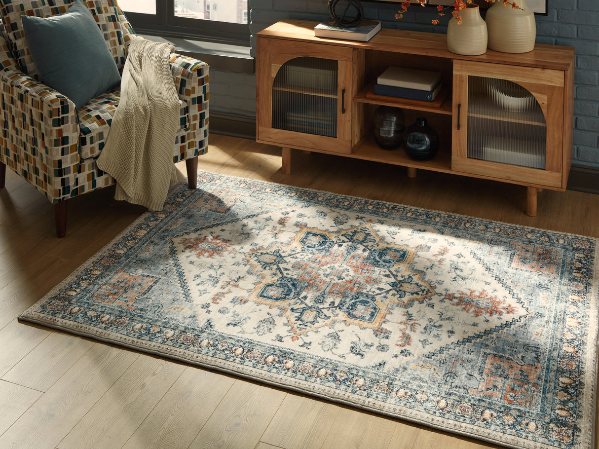 Furniture City Slidell - Ashley Furniture - Wallney Rug - 5' x 7' Area Rug / Multi - R407492
