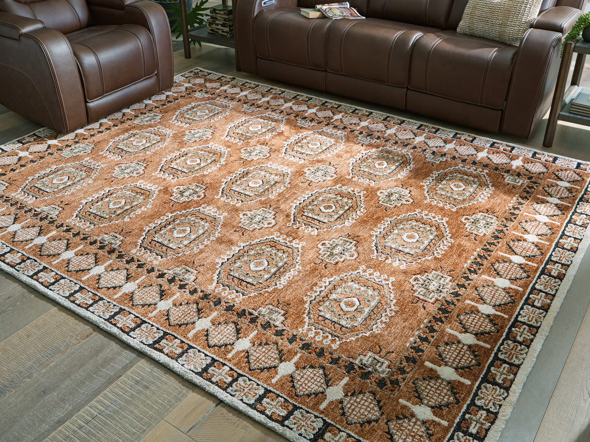 Furniture City Slidell - Ashley Furniture - Qaabiz Rug - 7'8" x 10' Area Rug / Sienna/Ivory/Black - R407521