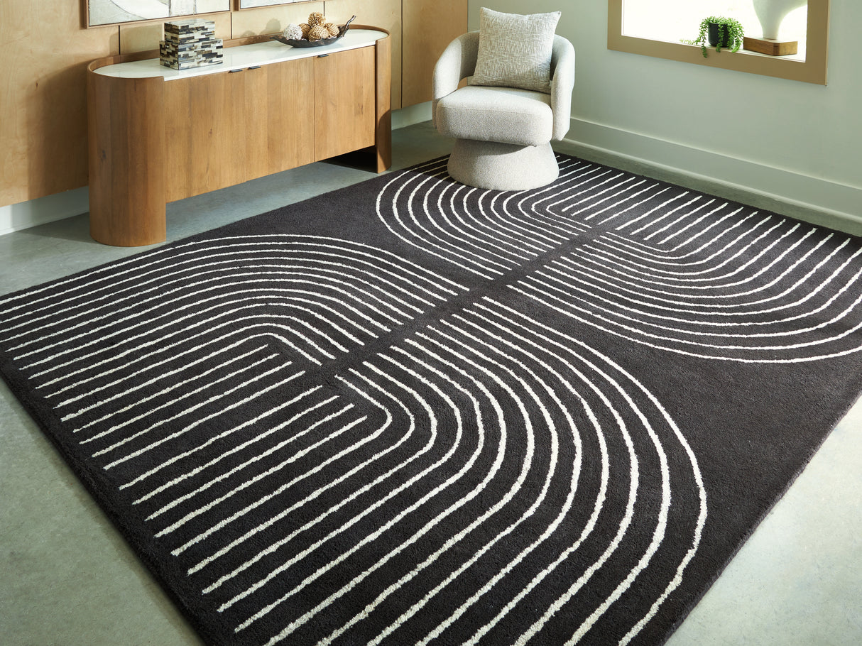 Furniture City Slidell - Ashley Furniture - Eldonmore Rug - 7'8" x 10' Area Rug / Black/Ivory - R407571