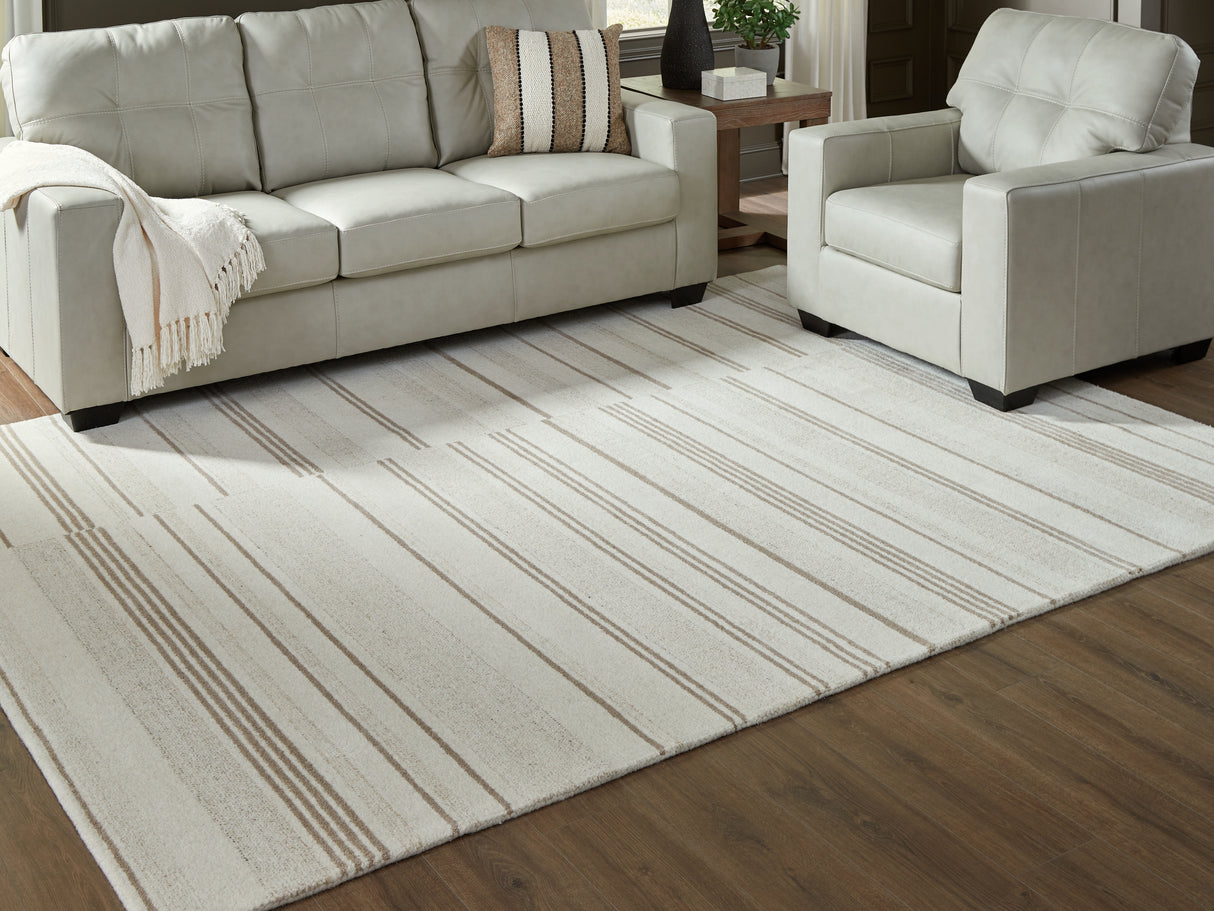 Furniture City Slidell - Ashley Furniture - Gadence Rug - 7'8" x 10' Area Rug / Ivory/Tan - R407641