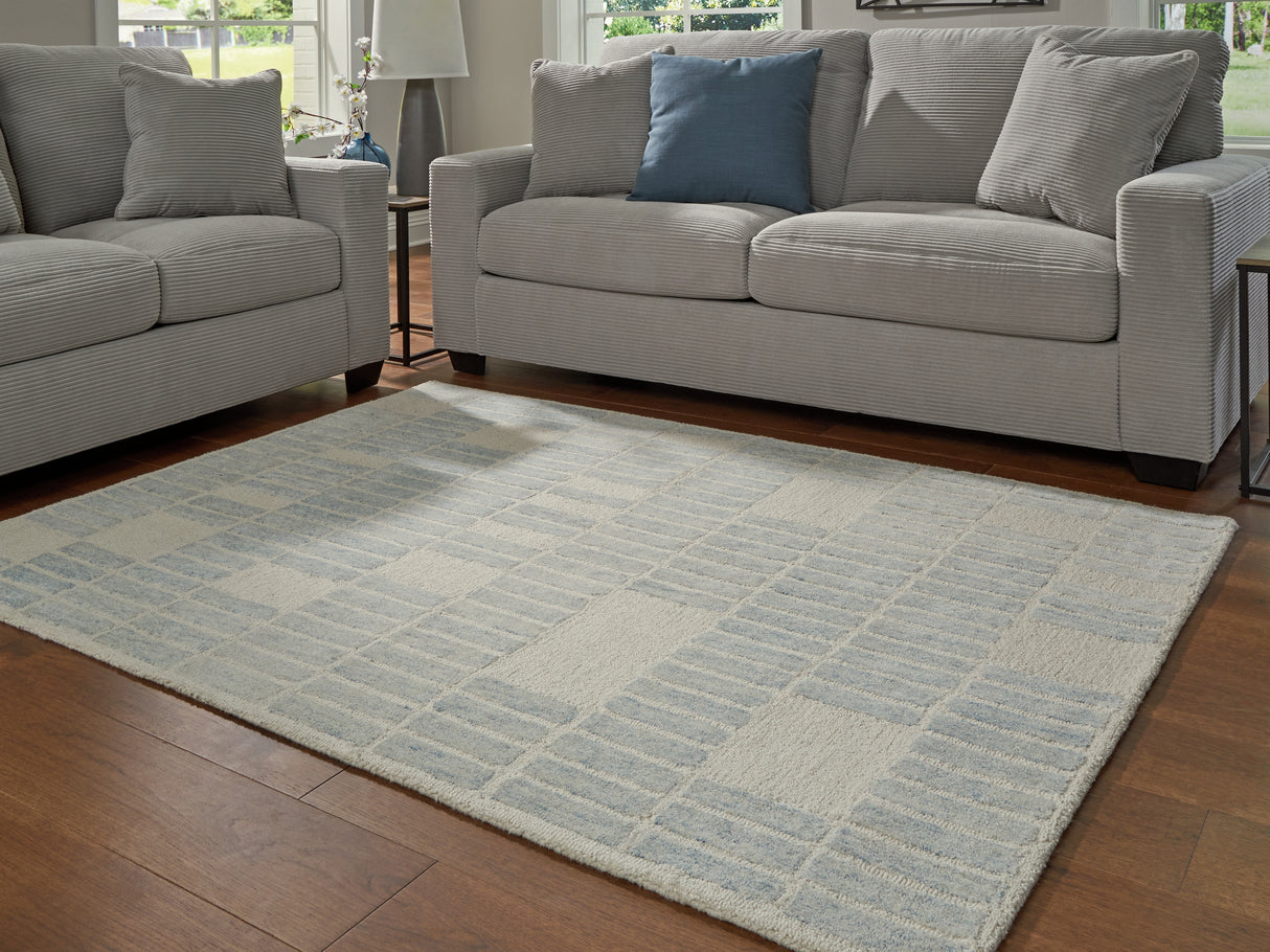Furniture City Slidell - Ashley Furniture - Dylanton Rug - 5' x 7' Area Rug / Ivory/Blue - R407812