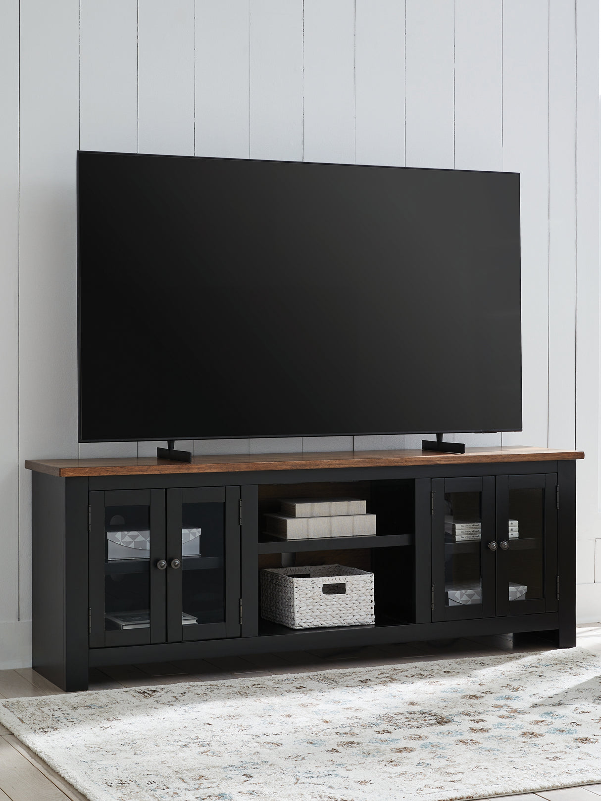 Furniture City Slidell - Ashley Furniture - Wildenauer 76" TV Stand - 76" / Brown/Black - W664-68