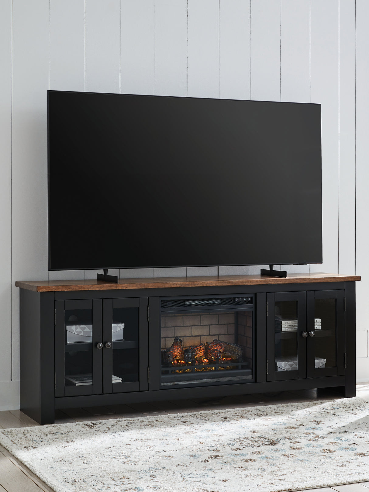 Furniture City Slidell - Ashley Furniture - Wildenauer 76" TV Stand with Electric Fireplace - 76" TV Stand with Electric Fireplace / Brown/Black - W664W1