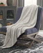 Furniture City Slidell - Ashley Furniture - Leonita Throw - Throw / Black/White - A1000769T