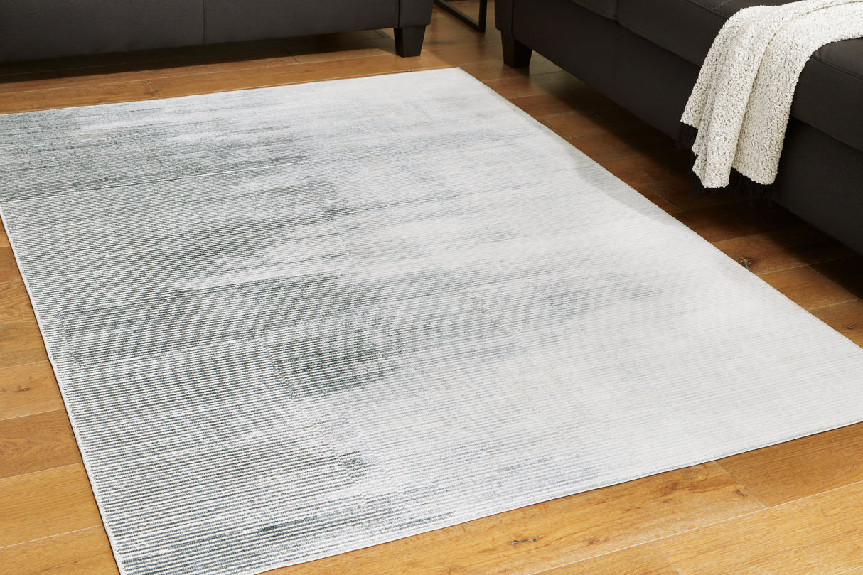Furniture City Slidell - Ashley Furniture - Milset Rug - 5'1" x 6'10" Washable Rug / Black/White/Gray - R406252