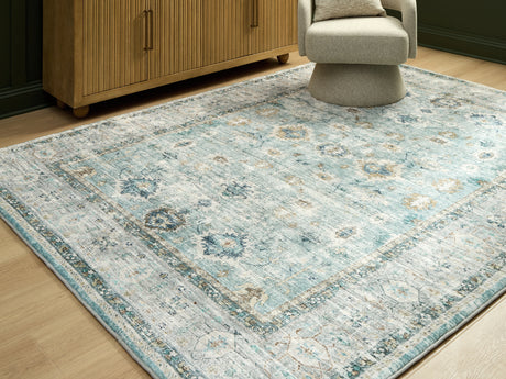 Furniture City Slidell - Ashley Furniture - Ladstoney Rug - 5' x 7' Area Rug / Teal/Beige/Ochre - R407502