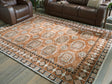 Furniture City Slidell - Ashley Furniture - Qaabiz Rug - 7'8" x 10' Area Rug / Sienna/Ivory/Black - R407521
