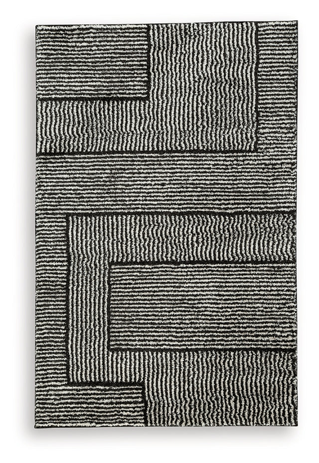 Furniture City Slidell - Ashley Furniture - Kurtmen Rug - 5' x 7' Area Rug / Black/Ivory - R407592