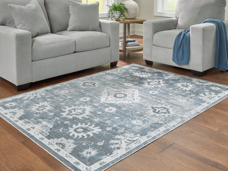 Furniture City Slidell - Ashley Furniture - Avanworths Rug - Washable 5'3" x 7' Area Rug / Blue/Gray/Ivory - R407792